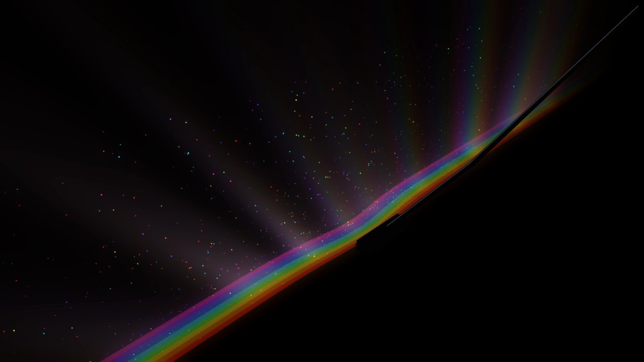 A black vacuum head on a dark floor, with rings of rainbow light thrown off its chrome wand and a burst of glowing coloured dust.